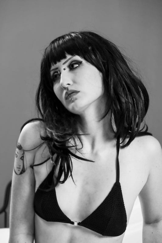 black and white image of alternative goth model bust shot
