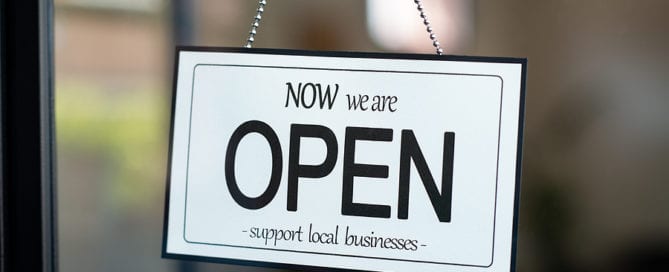 after covid, reopening business sign. support small business