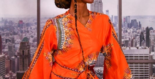 Jennypher, models - black mdel in bright orange african dress