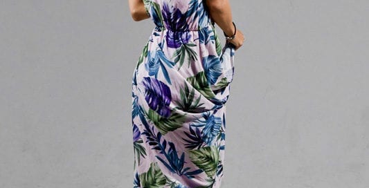 Kitti - brunette model looking over her shoulder