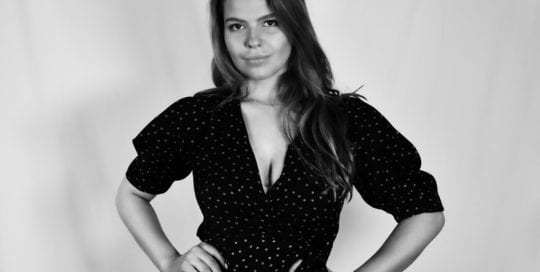 Leah, model - black and white photo of model in dark dress