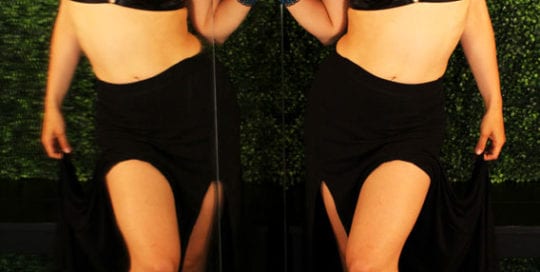 Aubrey - redhead model reflected in mirror