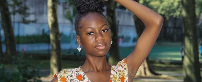 Various skin tones concept - Young woman with dark skin tone in a park